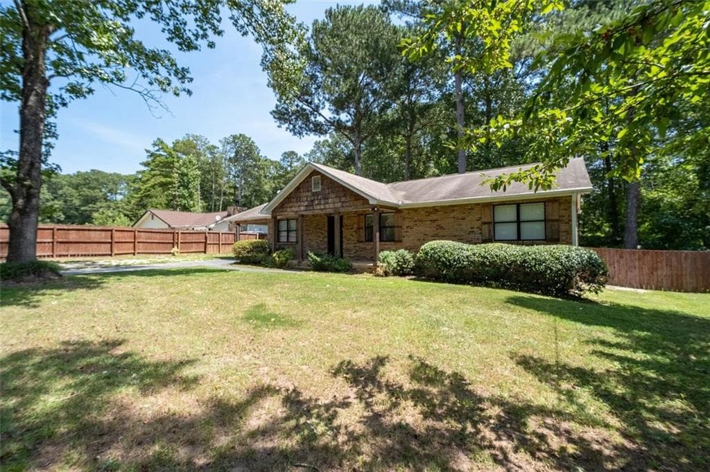 3 bedroom, 2 bathroom, 1,407 sq ft single family residence for sale at 1382 Cave Springs Road, Douglasville, GA 30134