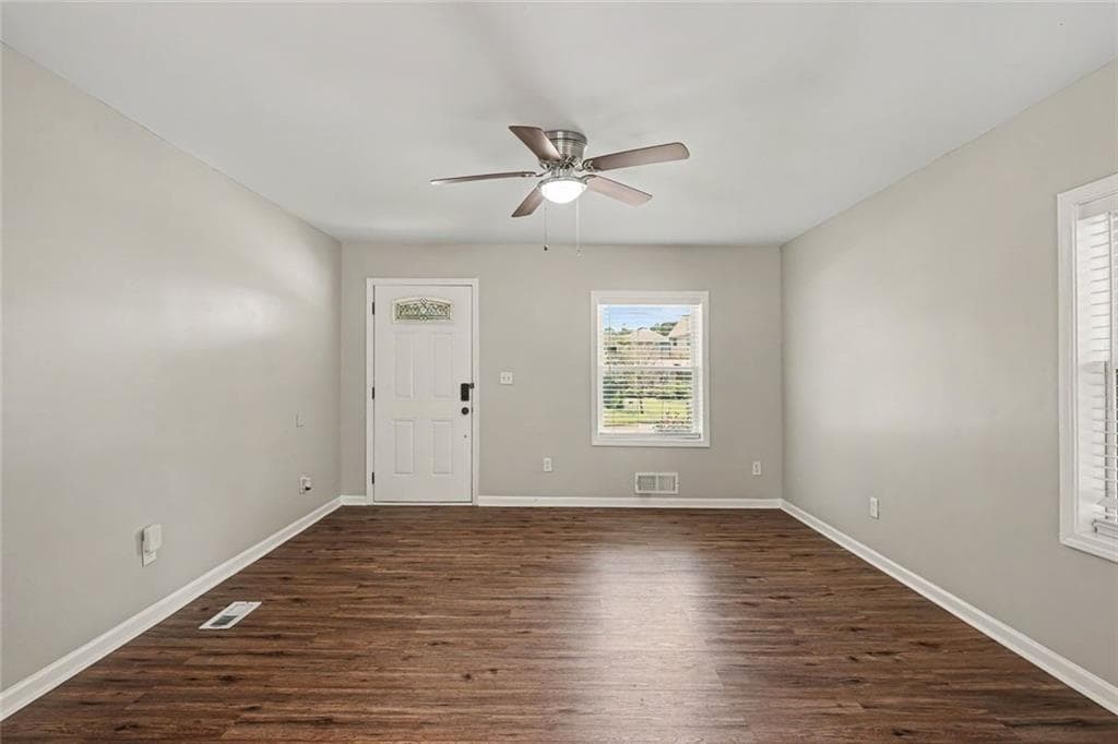 4 bedroom, 3 bathroom, 1,315 sq ft single family residence for sale at 5920 Rolling Oaks Drive, Cumming, GA 30040 — photo 5