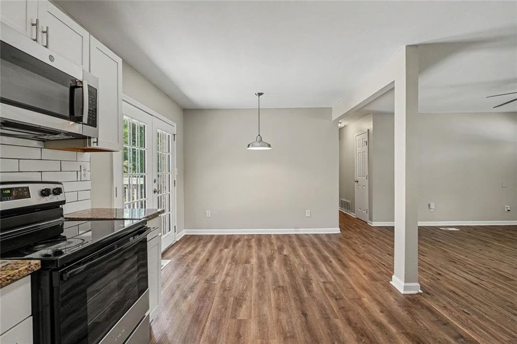 4 bedroom, 3 bathroom, 1,315 sq ft single family residence for sale at 5920 Rolling Oaks Drive, Cumming, GA 30040 — photo 9