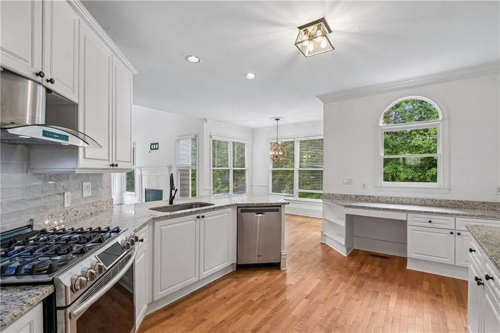 4 bedroom, 3 bathroom, 4,485 sq ft single family residence for sale at 905 Yosemite Drive, Suwanee, GA 30024 — photo 2