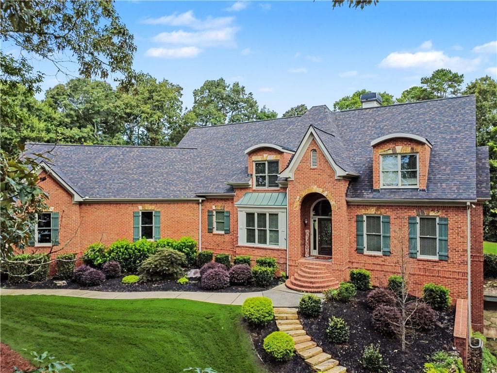 7 bedroom, 6 bathroom, 7,650 sq ft single family residence for sale at 8415 Glen Lake Drive, Cumming, GA 30028
