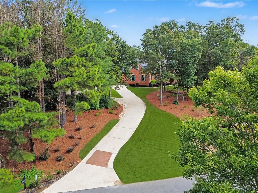 7 bedroom, 6 bathroom, 7,650 sq ft single family residence for sale at 8415 Glen Lake Drive, Cumming, GA 30028 — photo 2