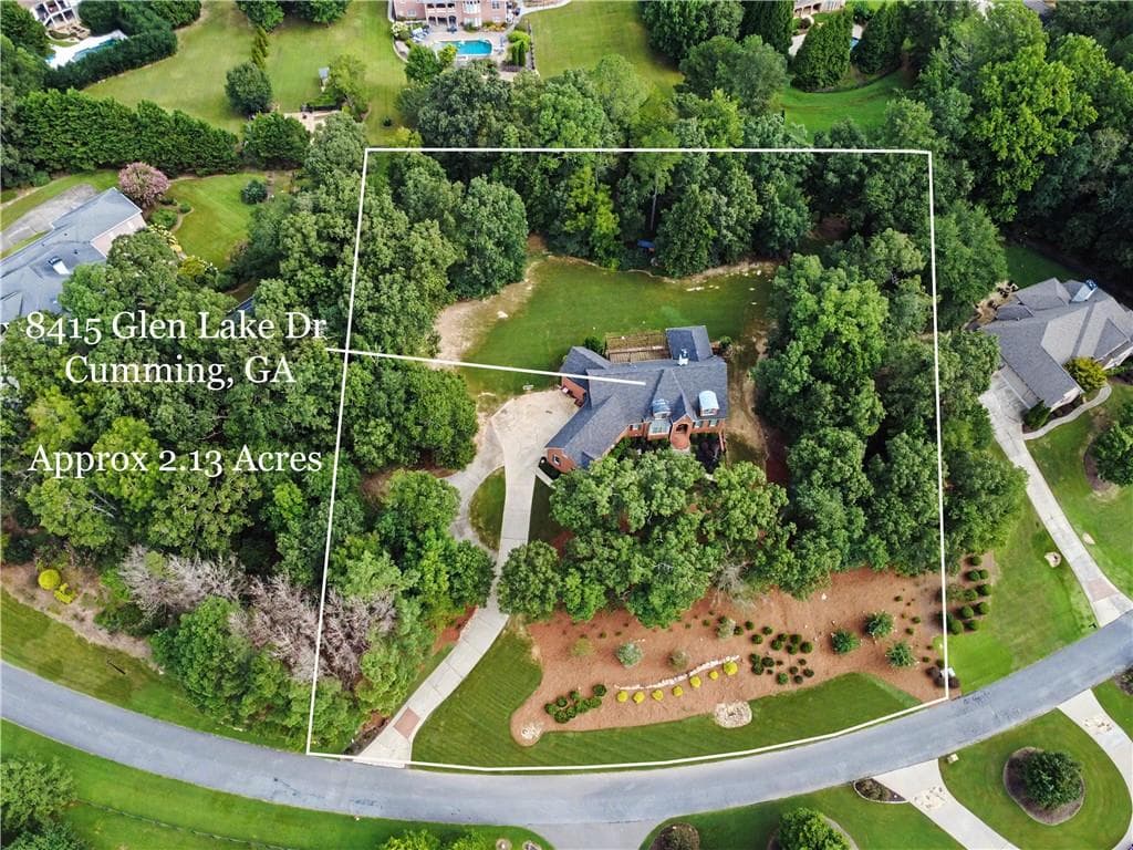 7 bedroom, 6 bathroom, 7,650 sq ft single family residence for sale at 8415 Glen Lake Drive, Cumming, GA 30028 — photo 3