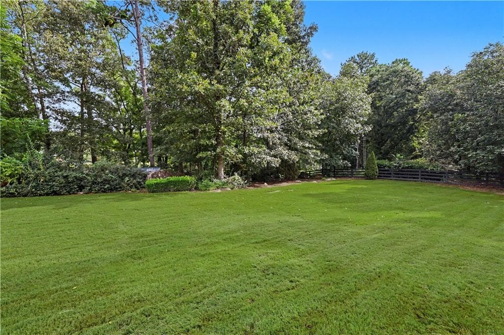 7 bedroom, 6 bathroom, 7,650 sq ft single family residence for sale at 8415 Glen Lake Drive, Cumming, GA 30028 — photo 4