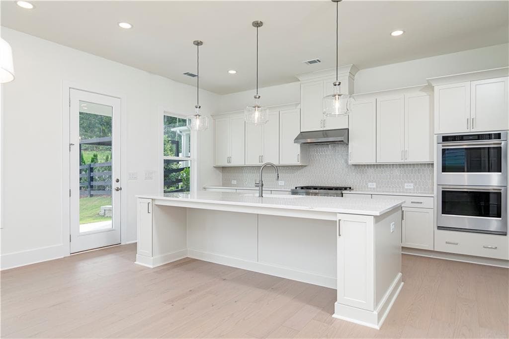 5 bedroom, 4 bathroom, 2,675 sq ft single family residence for sale at 4320 Waylon Drive, Cumming, GA 30028 — photo 9