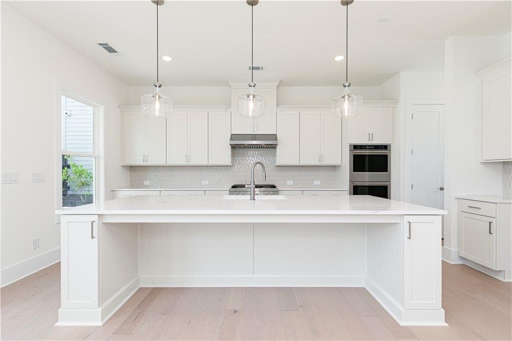 5 bedroom, 4 bathroom, 2,675 sq ft single family residence for sale at 4320 Waylon Drive, Cumming, GA 30028 — photo 10