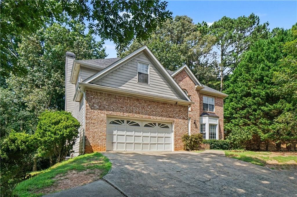 5 bedroom, 4 bathroom, 3,318 sq ft single family residence for sale at 213 Powers Court, Woodstock, GA 30189 — photo 2