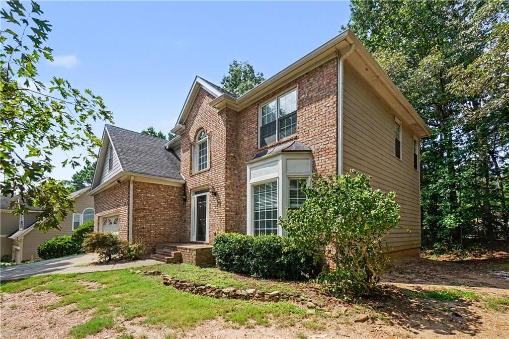 5 bedroom, 4 bathroom, 3,318 sq ft single family residence for sale at 213 Powers Court, Woodstock, GA 30189 — photo 3