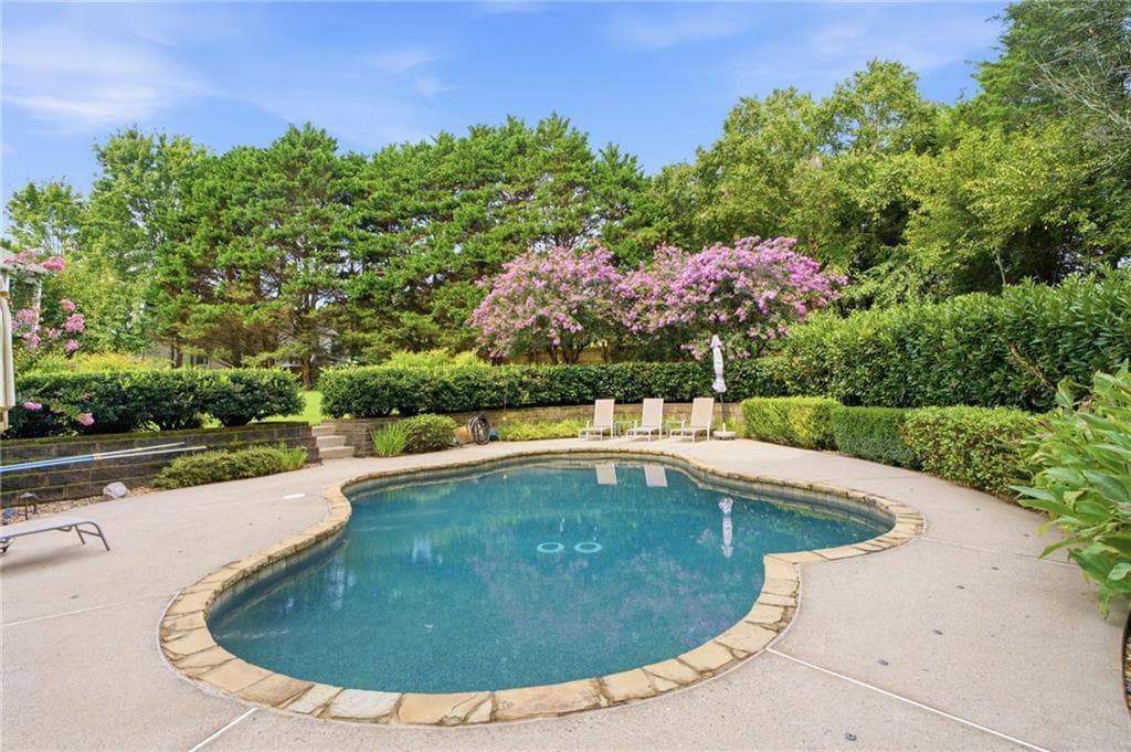 6 bedroom, 4 bathroom, 3,900 sq ft single family residence for sale at 6330 Fox Creek Drive, Cumming, GA 30040 — photo 8