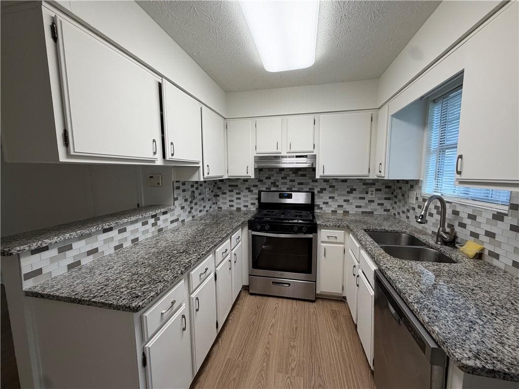 2 bedroom, 2 bathroom, 1,068 sq ft townhouse for sale at 6644 Ramsgate Way, Norcross, GA 30093 — photo 3