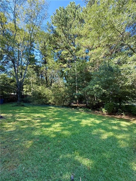 3 bedroom, 2 bathroom, 1,408 sq ft single family residence for sale at 1414 Sycamore Drive, Kennesaw, GA 30152 — photo 2