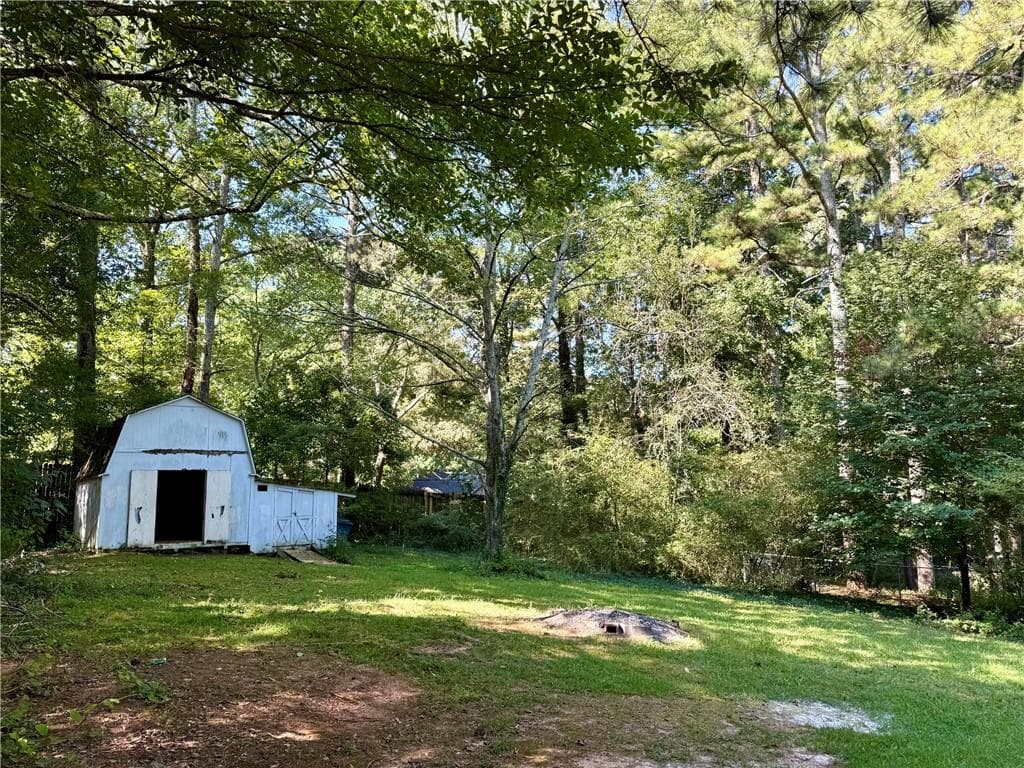 3 bedroom, 2 bathroom, 1,408 sq ft single family residence for sale at 1414 Sycamore Drive, Kennesaw, GA 30152 — photo 6