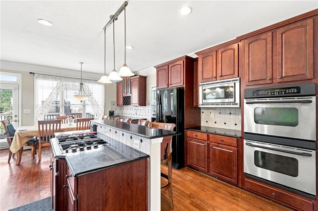 6 bedroom, 5 bathroom, 4,368 sq ft single family residence for sale at 5804 Old Mill Trace, Lithonia, GA 30038 — photo 10