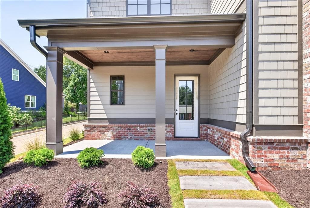 4 bedroom, 4 bathroom, 3,112 sq ft single family residence for sale at 5816 Mitchell Street, Flowery Branch, GA 30542 — photo 2