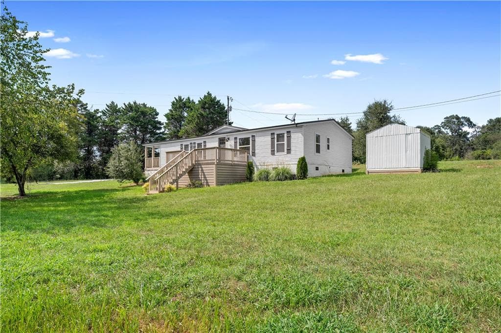 4 bedroom, 3 bathroom, 1,544 sq ft single family residence for sale at 6035 Highway 29, Royston, GA 30662 — photo 2
