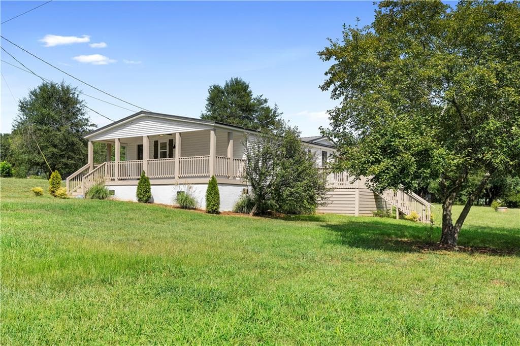 4 bedroom, 3 bathroom, 1,544 sq ft single family residence for sale at 6035 Highway 29, Royston, GA 30662 — photo 3