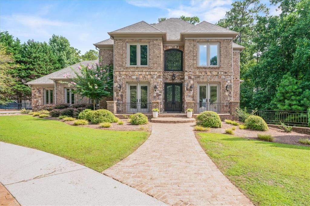6 bedroom, 6 bathroom, 6,512 sq ft single family residence for sale at 1605 Lockridge Drive, Cumming, GA 30041