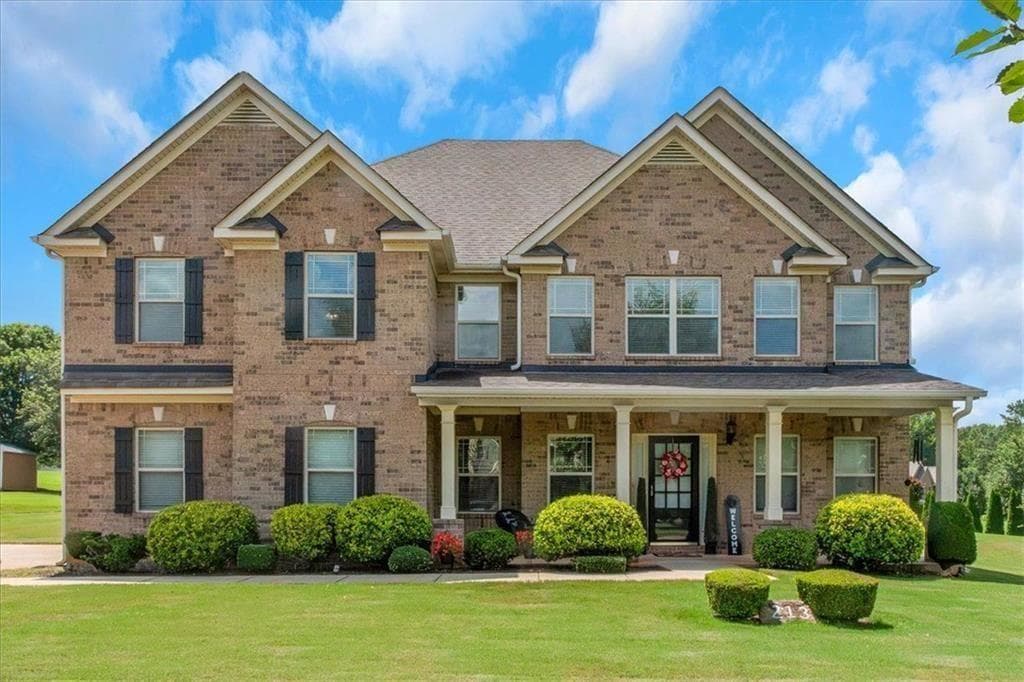 4 bedroom, 4 bathroom, 4,288 sq ft single family residence for sale at 213 Manresa Court, Hampton, GA 30228 — photo 4