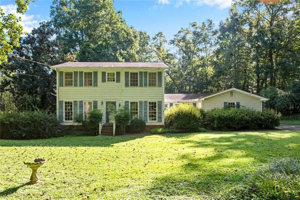 4 bedroom, 3 bathroom, 2,402 sq ft single family residence for sale at 1255 Lake Charles Drive, Roswell, GA 30075 — photo 1 of 40