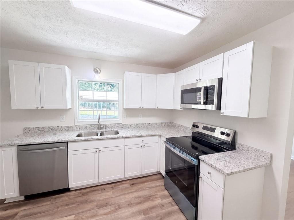 2 bedroom, 2 bathroom, 1,091 sq ft single family residence for sale at 467 Oak Way, Lawrenceville, GA 30046 — photo 2