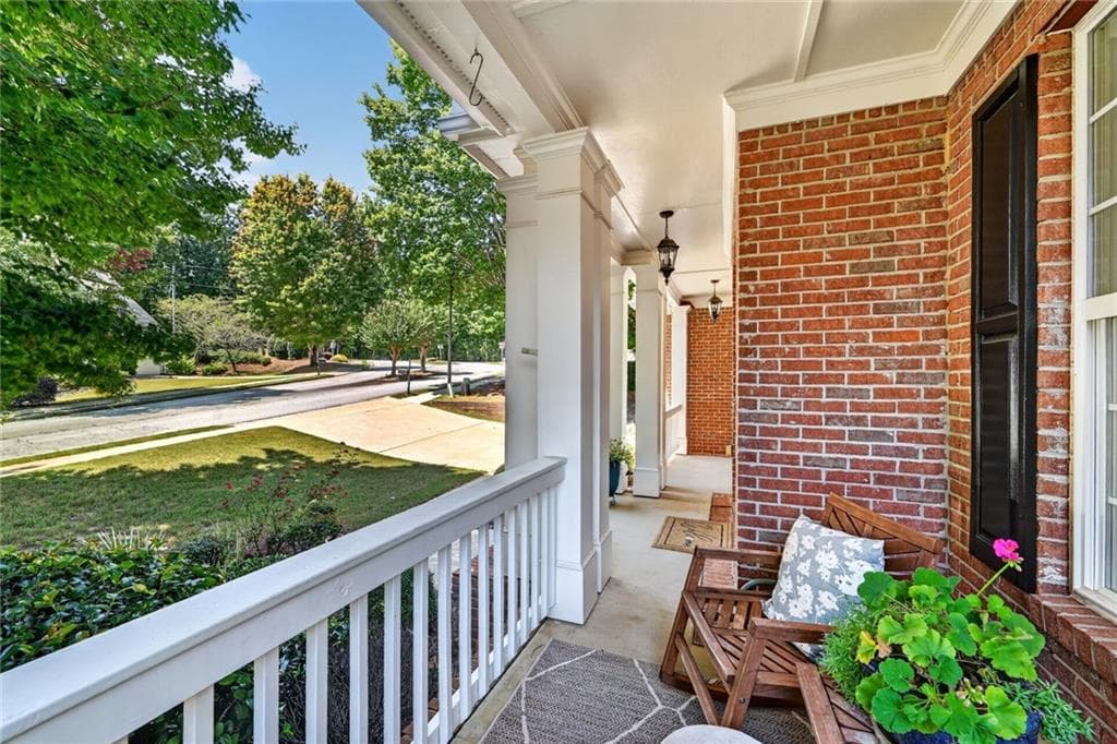 5 bedroom, 4 bathroom, 4,280 sq ft single family residence for sale at 6587 River Island Drive, Buford, GA 30518 — photo 3