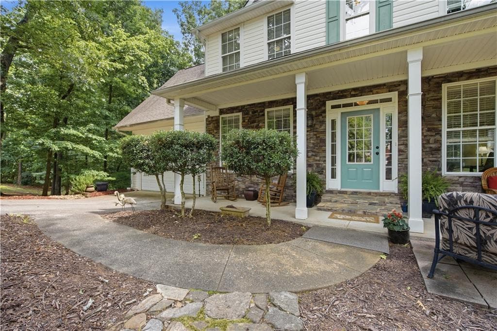 4 bedroom, 4 bathroom, 2,140 sq ft single family residence for sale at 4050 Shelby Lane, Cumming, GA 30041 — photo 5