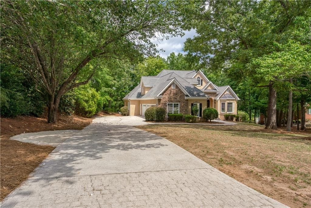 6 bedroom, 5 bathroom, 6,930 sq ft single family residence for sale at 303 Broadmoor Way, Mcdonough, GA 30253 — photo 2