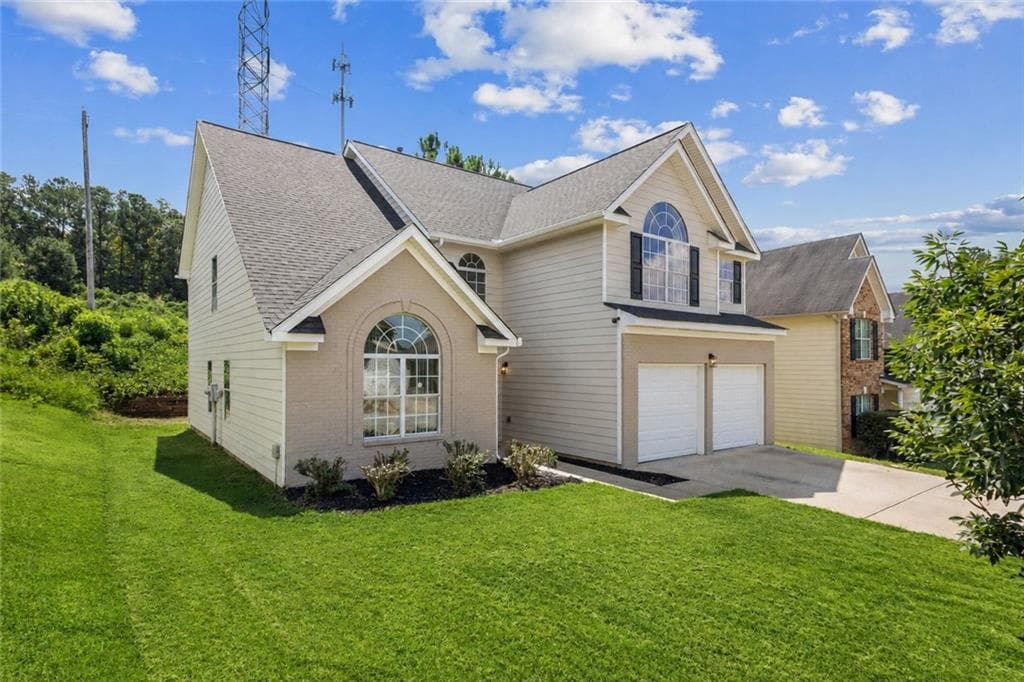 5 bedroom, 3 bathroom, 3,096 sq ft single family residence for sale at 5654 Laurel Ridge Drive, East Point, GA 30344 — photo 2