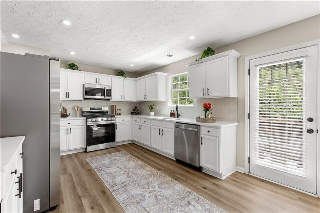 5 bedroom, 3 bathroom, 3,096 sq ft single family residence for sale at 5654 Laurel Ridge Drive, East Point, GA 30344 — photo 8