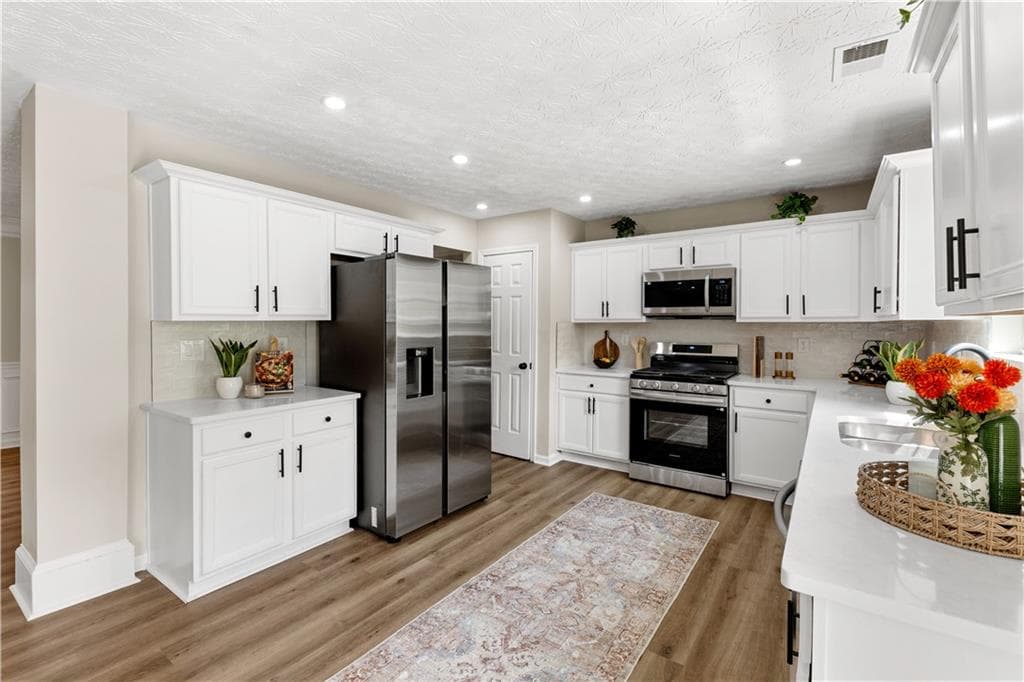 5 bedroom, 3 bathroom, 3,096 sq ft single family residence for sale at 5654 Laurel Ridge Drive, East Point, GA 30344 — photo 9