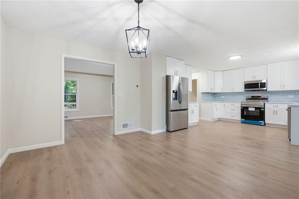 4 bedroom, 3 bathroom, 2,002 sq ft single family residence for sale at 4891 Lake Forest Drive, Conyers, GA 30094 — photo 8