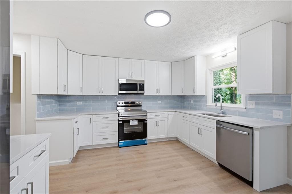 4 bedroom, 3 bathroom, 2,002 sq ft single family residence for sale at 4891 Lake Forest Drive, Conyers, GA 30094 — photo 10