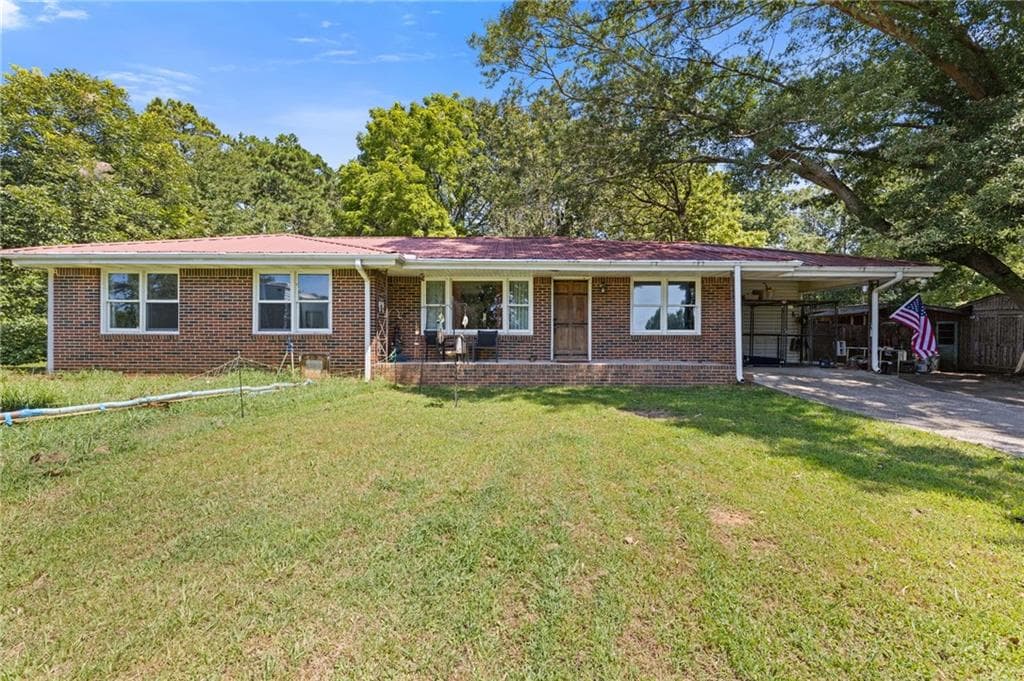 3 bedroom, 2 bathroom, 1,392 sq ft single family residence for sale at 8274 Highway 166, Douglasville, GA 30135 — photo 2
