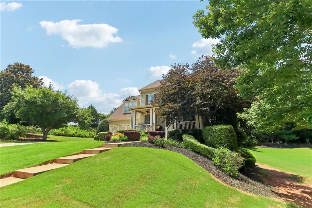 5 bedroom, 4 bathroom, 4,565 sq ft single family residence under contract at 5631 Grand Reunion Drive, Hoschton, GA 30548 — photo 2