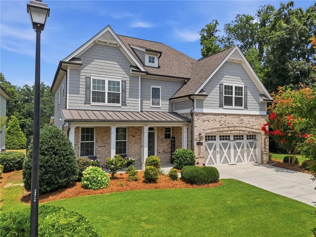 4 bedroom, 4 bathroom, 3,328 sq ft single family residence for sale at 7110 Sailaway Drive, Flowery Branch, GA 30542 — photo 2