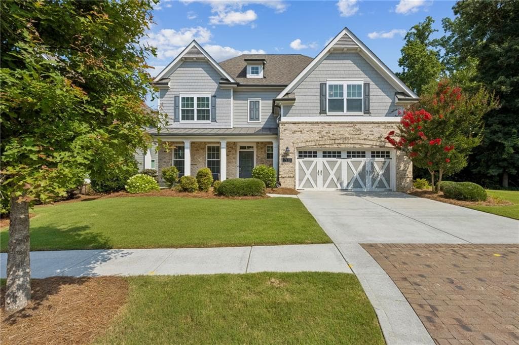 4 bedroom, 4 bathroom, 3,328 sq ft single family residence for sale at 7110 Sailaway Drive, Flowery Branch, GA 30542