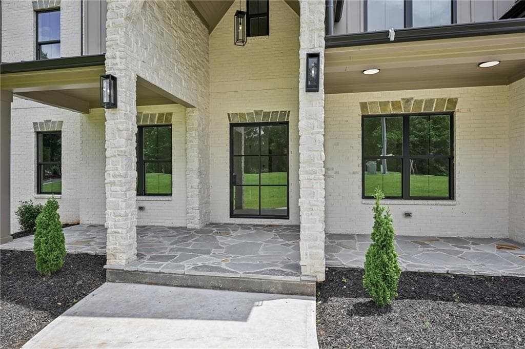 5 bedroom, 6 bathroom, 8,569 sq ft single family residence for sale at 3263 N Bogan Road, Buford, GA 30519 — photo 2