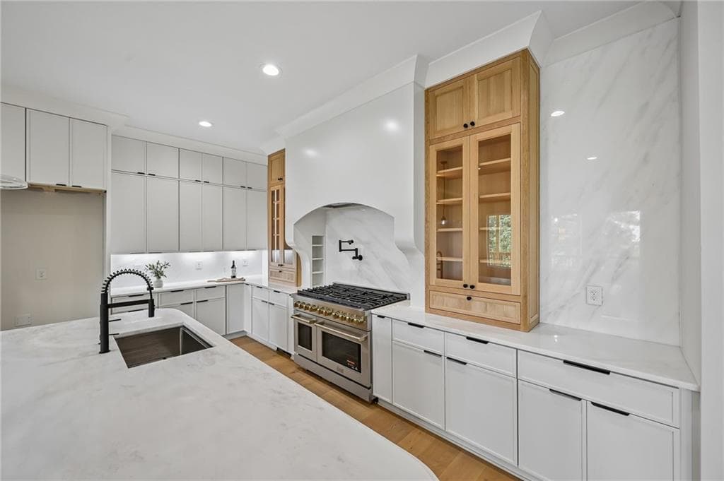 5 bedroom, 6 bathroom, 8,569 sq ft single family residence for sale at 3263 N Bogan Road, Buford, GA 30519 — photo 9