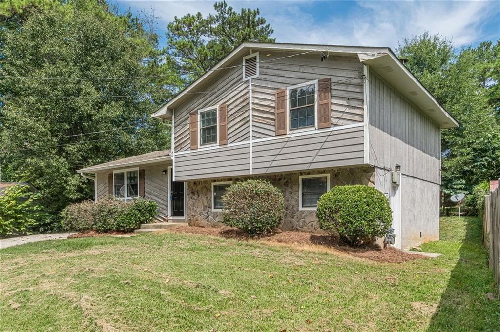 3 bedroom, 3 bathroom, 1,565 sq ft single family residence under contract at 6077 Cherokee Valley Lane, Lithonia, GA 30058 — photo 2