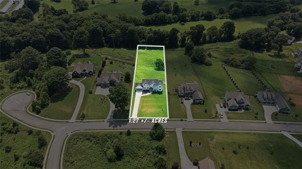 4 bedroom, 4 bathroom, 2,878 sq ft single family residence for sale at 5746 Avalon Commons Way, Clermont, GA 30527 — photo 4