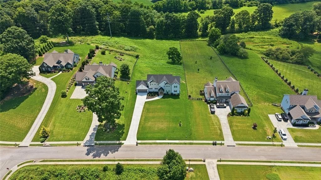 4 bedroom, 4 bathroom, 2,878 sq ft single family residence for sale at 5746 Avalon Commons Way, Clermont, GA 30527 — photo 5