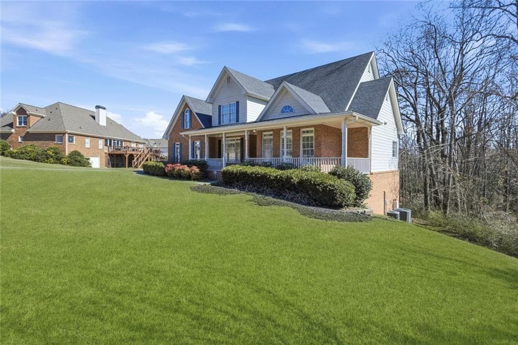 6 bedroom, 6 bathroom, 4,495 sq ft single family residence for sale at 3805 Jones Creek Drive, Buford, GA 30519 — photo 2