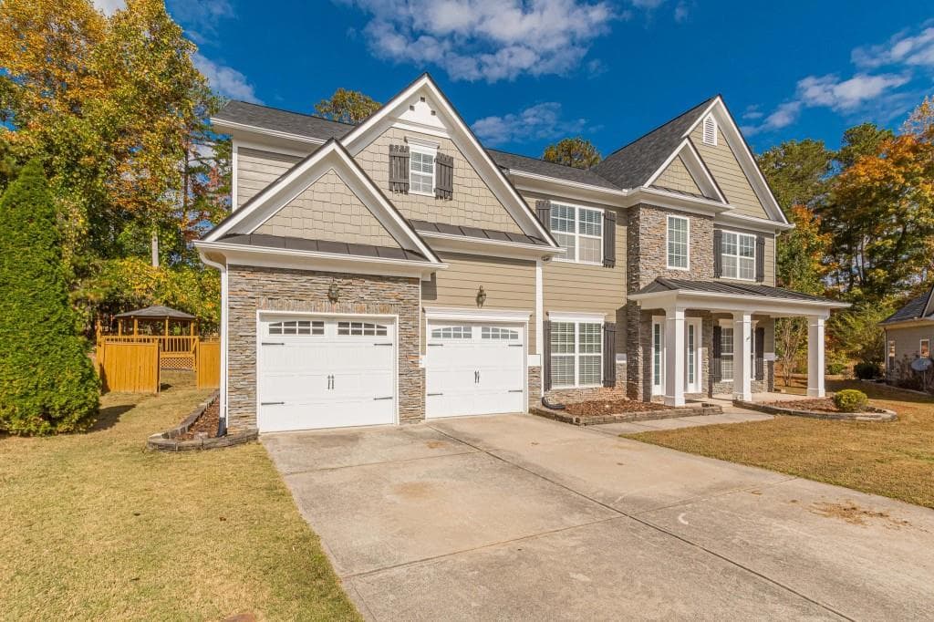 7 bedroom, 4 bathroom, 3,800 sq ft single family residence for sale at 2004 CREEK POINTE Way, Villa Rica, GA 30180 — photo 2