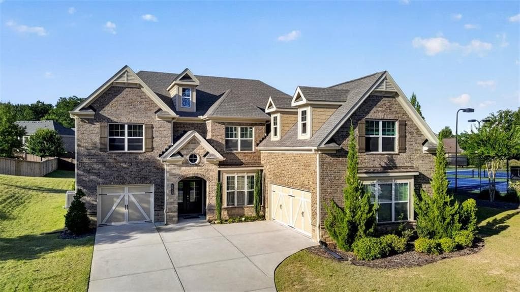 5 bedroom, 4 bathroom, 4,258 sq ft single family residence for sale at 5625 Turnbridge Pass, Cumming, GA 30040 — photo 2