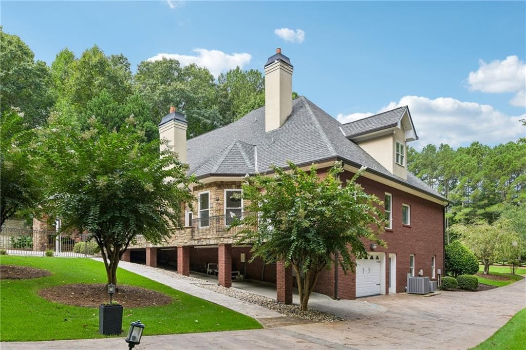 9 bedroom, 6 bathroom, 8,174 sq ft single family residence for sale at 2431 Rabbit Farm Circle, Loganville, GA 30052 — photo 7