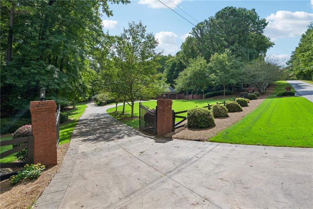 9 bedroom, 6 bathroom, 8,174 sq ft single family residence for sale at 2431 Rabbit Farm Circle, Loganville, GA 30052 — photo 8