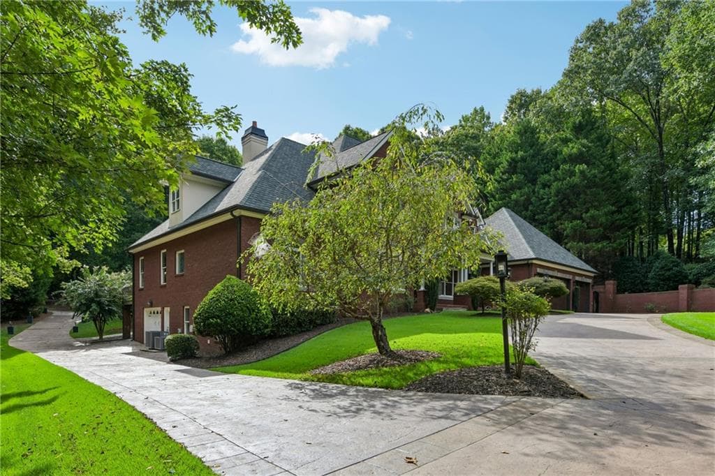 9 bedroom, 6 bathroom, 8,174 sq ft single family residence for sale at 2431 Rabbit Farm Circle, Loganville, GA 30052 — photo 9