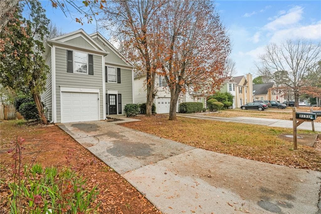 3 bedroom, 3 bathroom, 1,496 sq ft single family residence for sale at 3131 Linden Drive, Lawrenceville, GA 30044 — photo 2