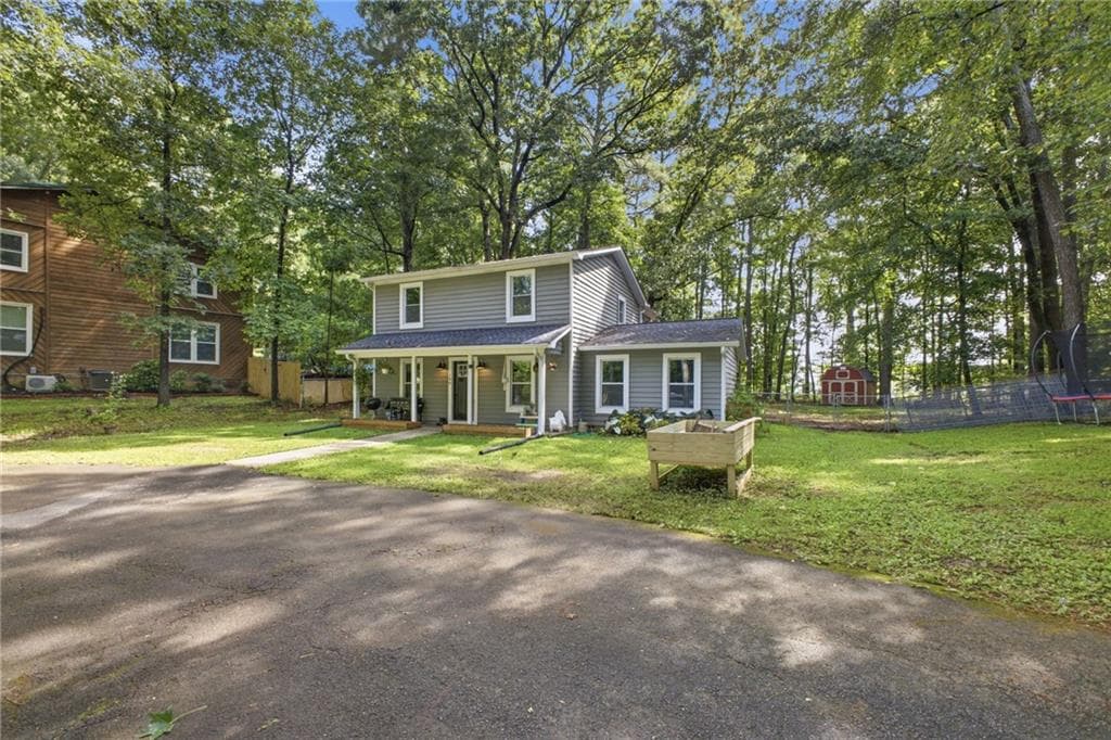 4 bedroom, 2 bathroom, 2,115 sq ft single family residence for sale at 106 Northside Drive, Calhoun, GA 30701 — photo 2