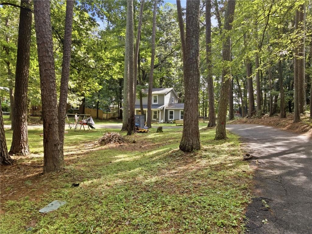4 bedroom, 2 bathroom, 2,115 sq ft single family residence for sale at 106 Northside Drive, Calhoun, GA 30701 — photo 4